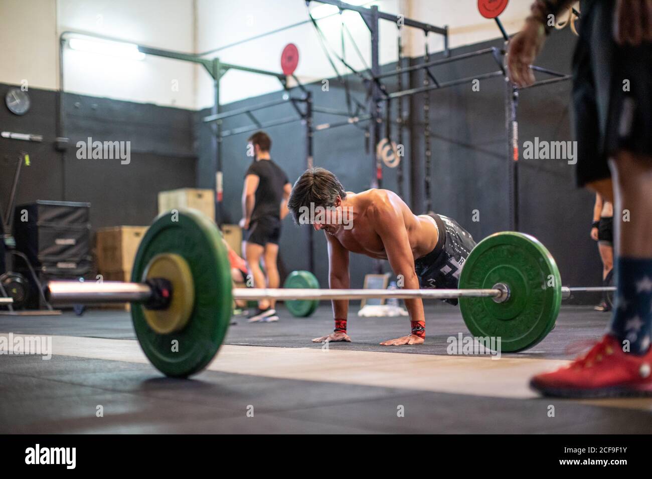 Fit man doing push-ups Stock Photo