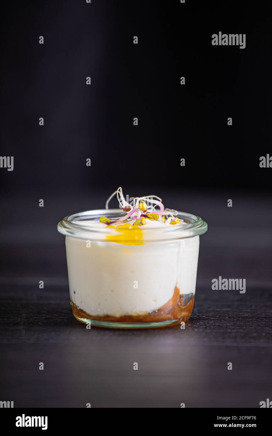 Mousse of goat cheese caramelized onion and extra virgin olive oil caviar Stock Photo