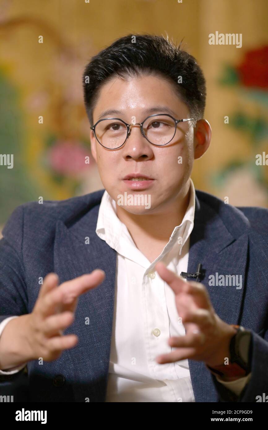 (200904) -- HONG KONG, Sept. 4, 2020 (Xinhua) -- Kenneth Fok Kai-kong, a newly-elected vice chairman of All-China Youth Federation, gestures during an interview with Xinhua on Aug. 31, 2020. TO GO WITH 'Interview: Kenneth Fok calls for more efforts to help Hong Kong youth tap Greater Bay Area opportunities' (Xinhua/Wu Xiaochu) Stock Photo