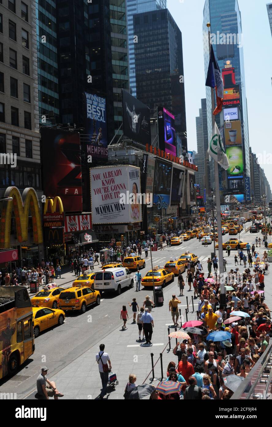Crowd of people walking on the New York City Times Square, New York, USA Stock Photo