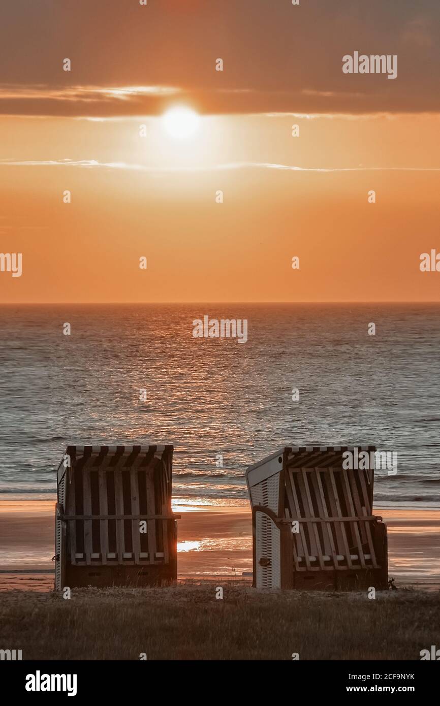 beach chair, sunset, wadden sea Stock Photo
