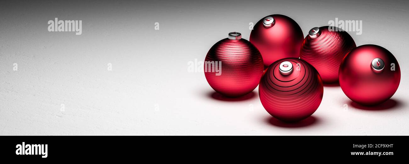 Red Christmas decoration on a white stone background. Banner size with copy space Stock Photo