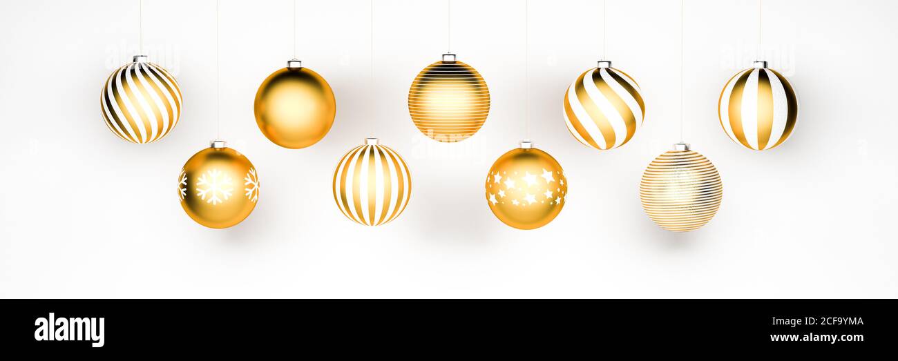 Golden and white Christmas Baubles with different designs hanging in ...