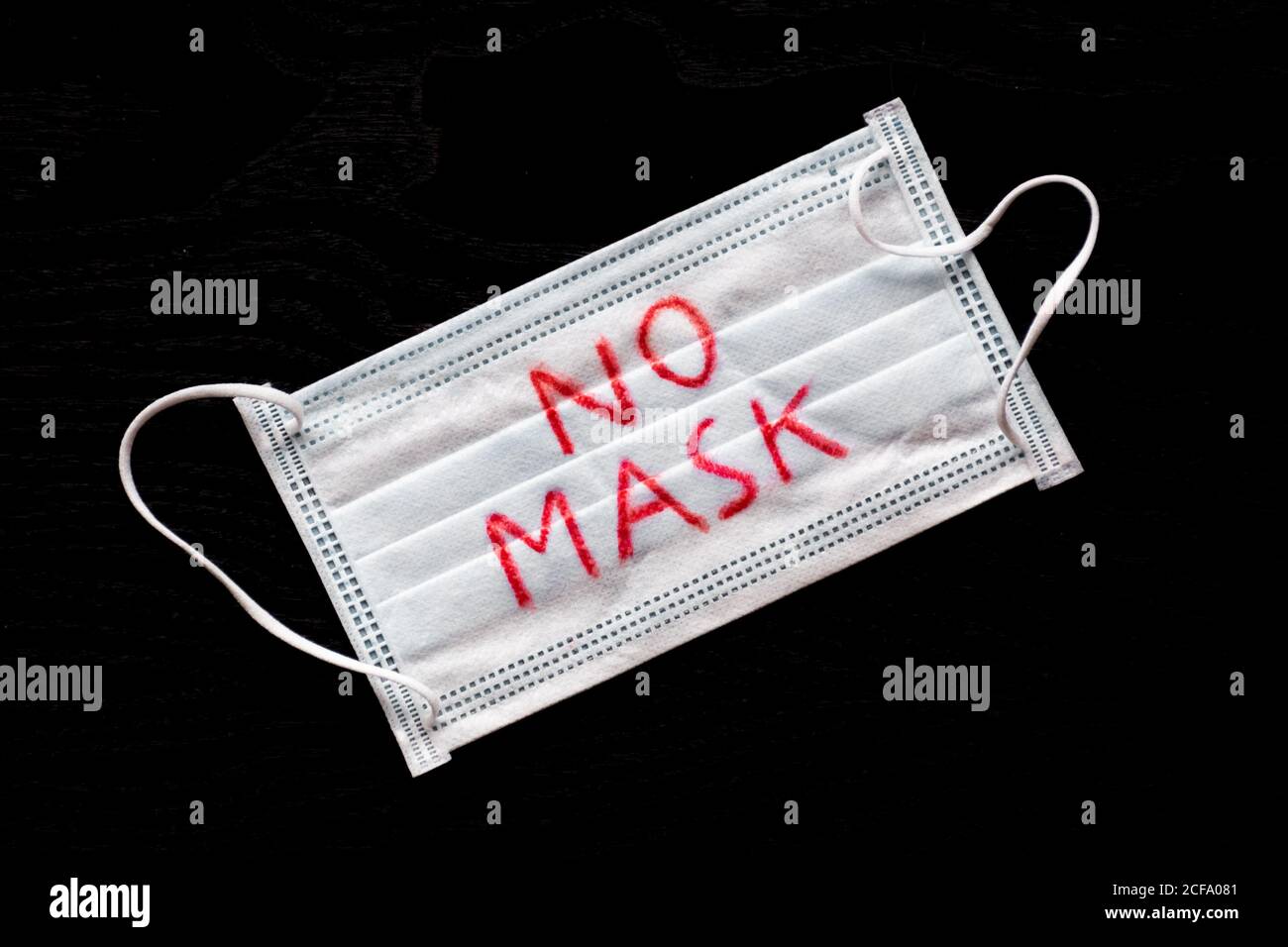 No mask, face protective mask against spread of Coronavirus or COVID-19 Stock Photo