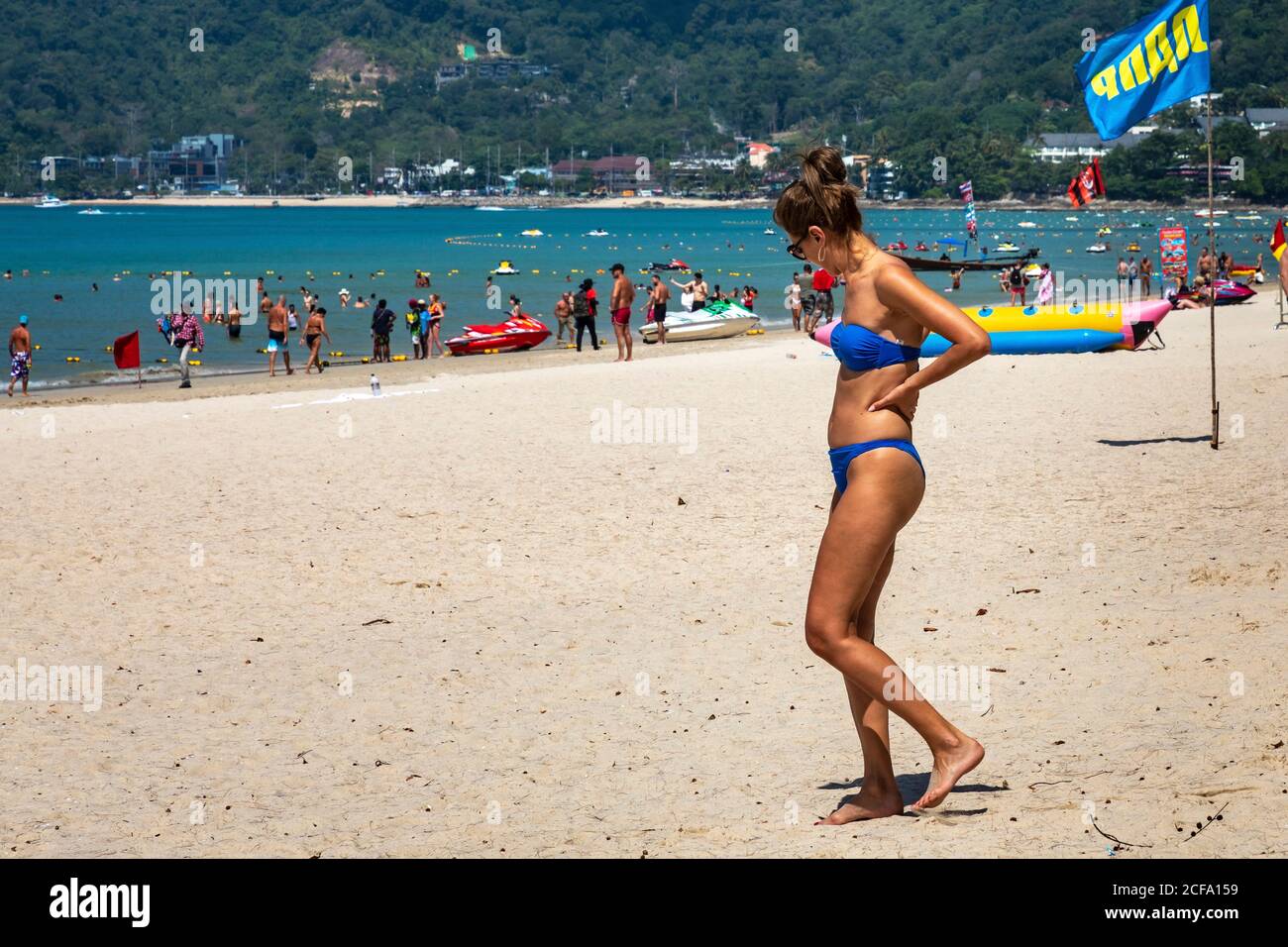 Tourist in bikini walking the beach, Beach, Phuket, Thailand Stock - Alamy