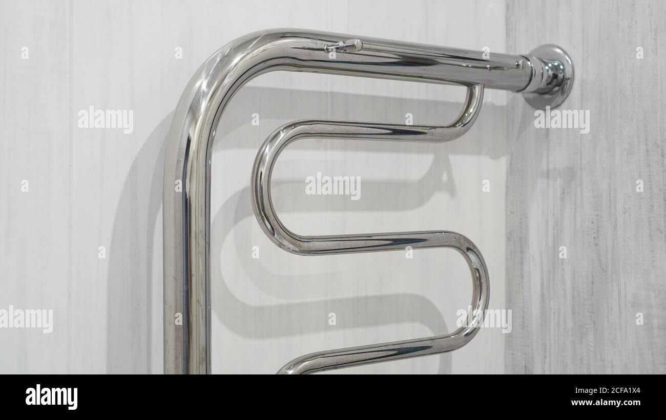 Modern bathroom towel dryer white bathroom interior background Stock