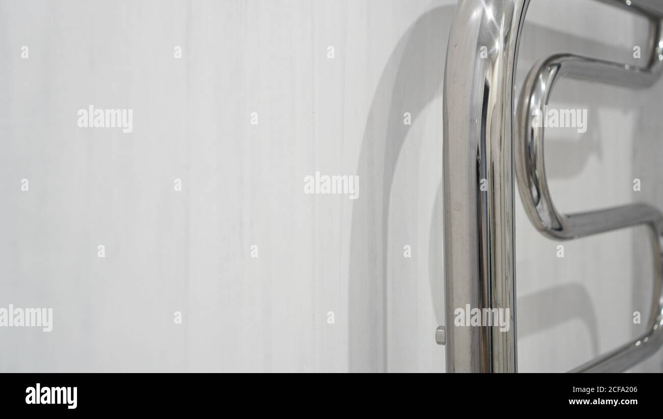 Modern bathroom towel dryer white bathroom interior background Stock