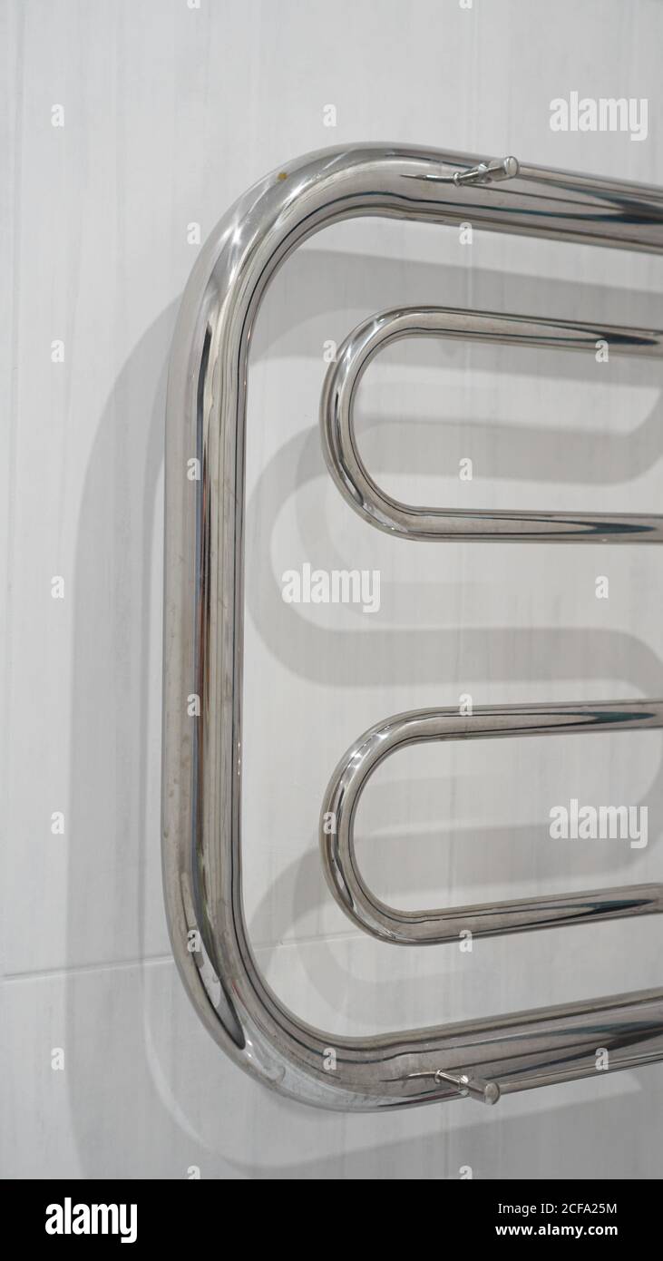 Modern bathroom towel dryer white bathroom interior background Stock