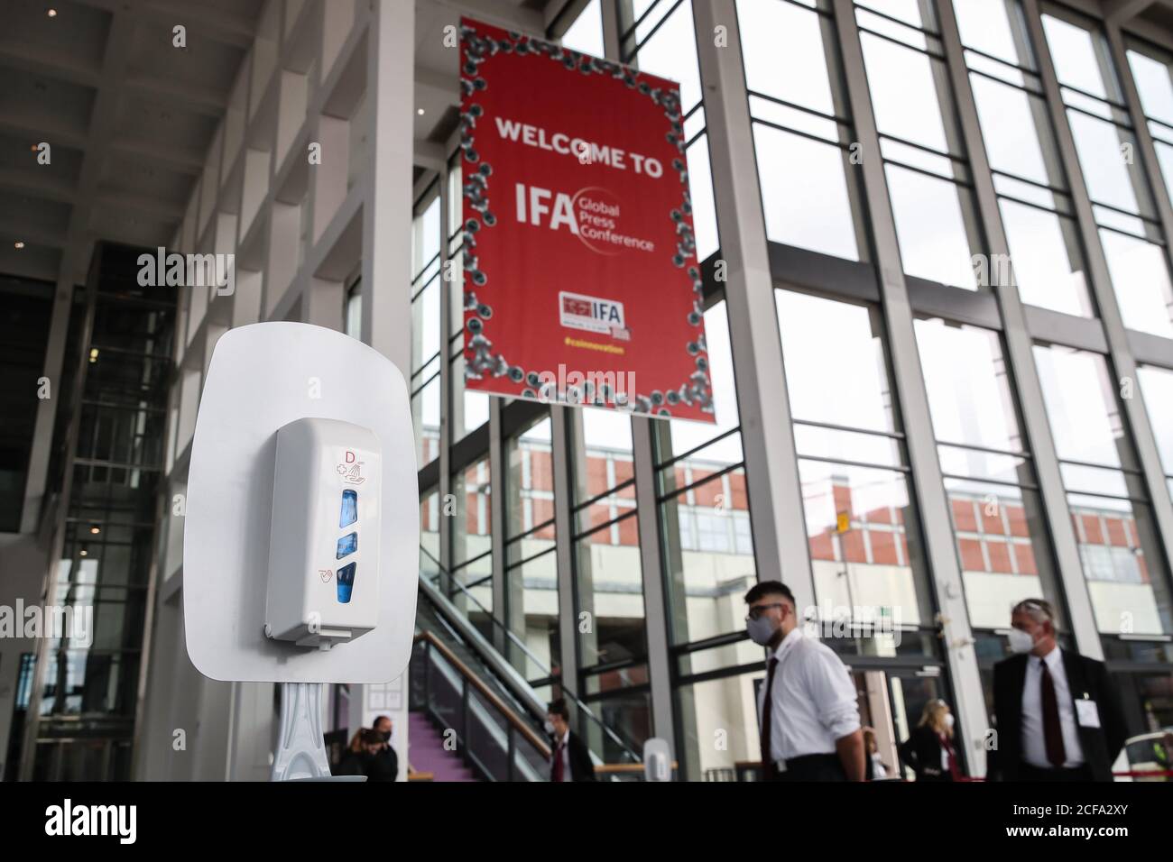 (200904) -- BERLIN, Sept. 4, 2020 (Xinhua) -- Hand sanitizer is seen at the entrance of the 2020 IFA fair in Berlin, capital of Germany, Sept. 4, 2020. The technology trade fair IFA kicked off here on Thursday, with a variety of hygiene measures taken due to the ongoing COVID-19 crisis. (Xinhua/Shan Yuqi) Stock Photo