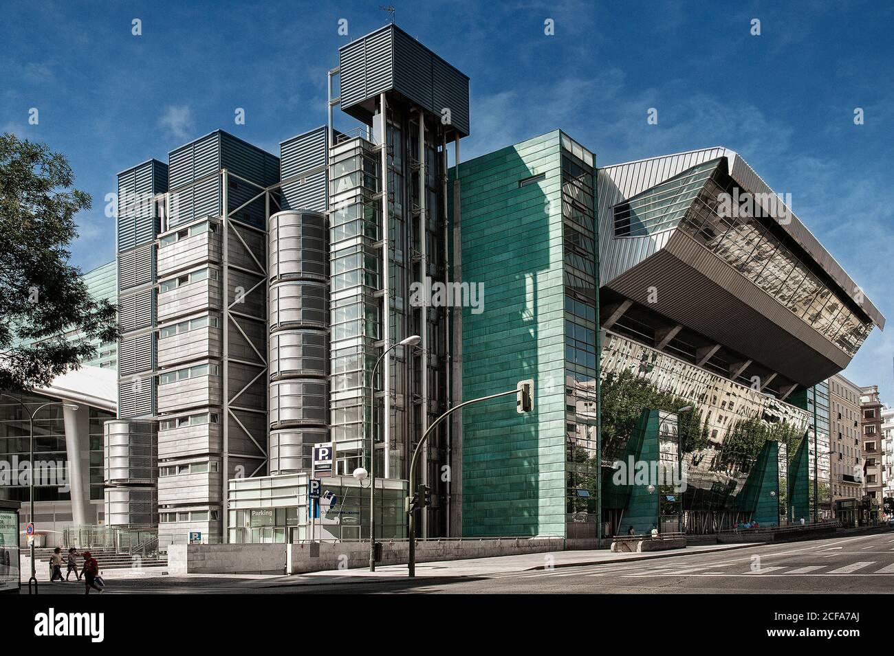 Contemporary building with geometric architecture and colorful gray and blue exterior design in downtown in daytime Stock Photo