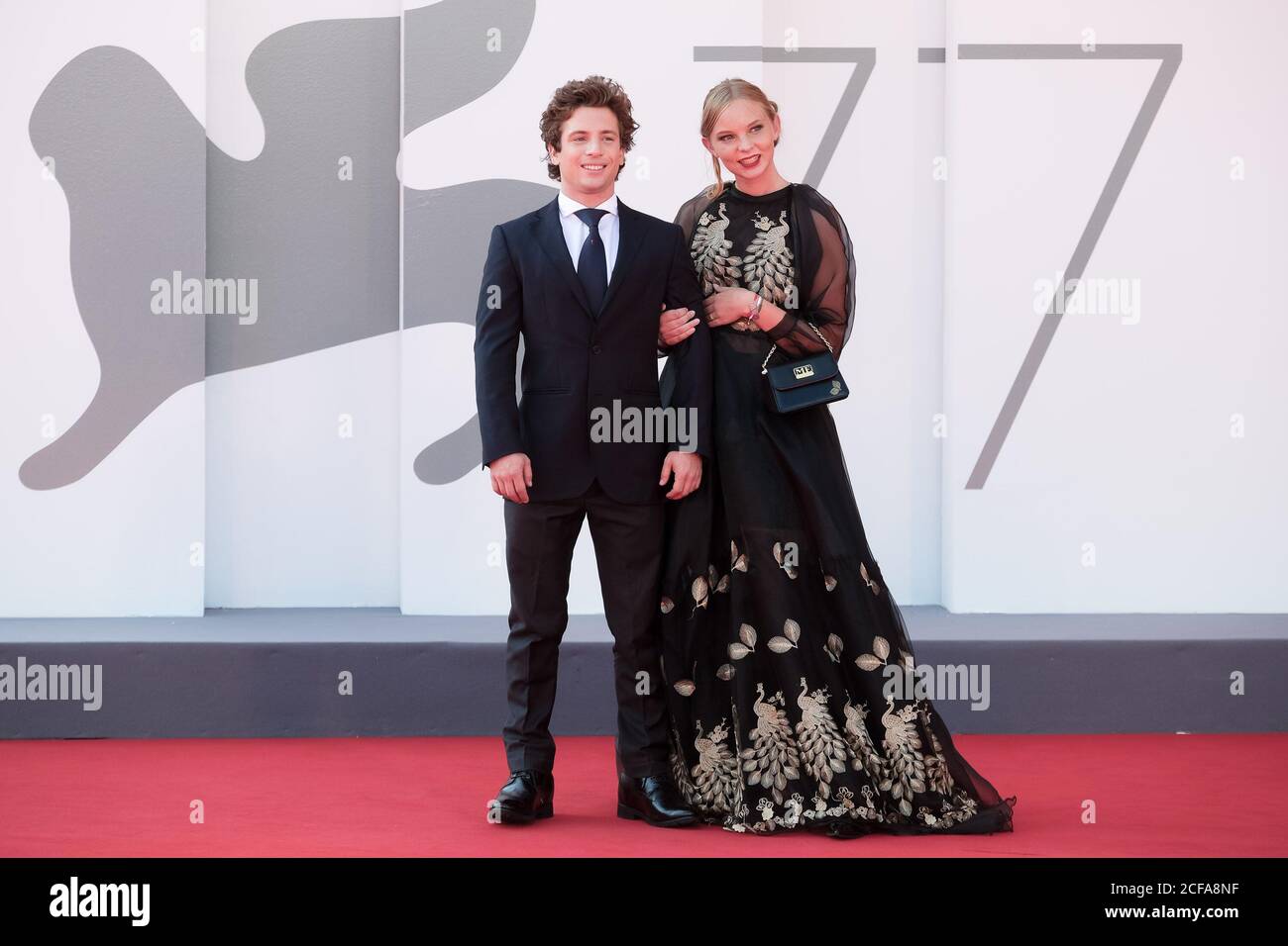 Palazzo del Cinema, Lido, Venice, Italy. 4th Sep, 2020. Prince Cosimo de Medici of Tuscany, Princess Elisa pose on the red carpet at the The Disciple. Picture by Credit: Julie Edwards/Alamy Live News Stock Photo