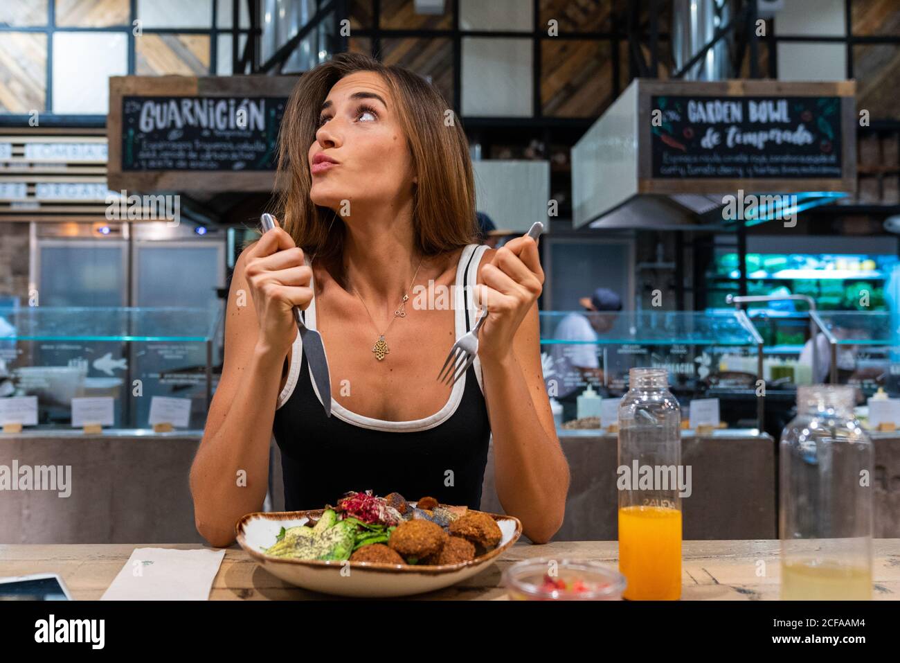 Female knife fork hands hi-res stock photography and images - Alamy