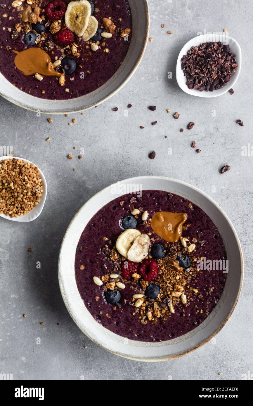 Healthy acai bowls with ingredients Stock Photo Alamy