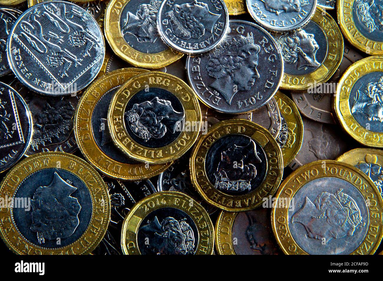 Studio shot of scattered British Pound coins Stock Photo