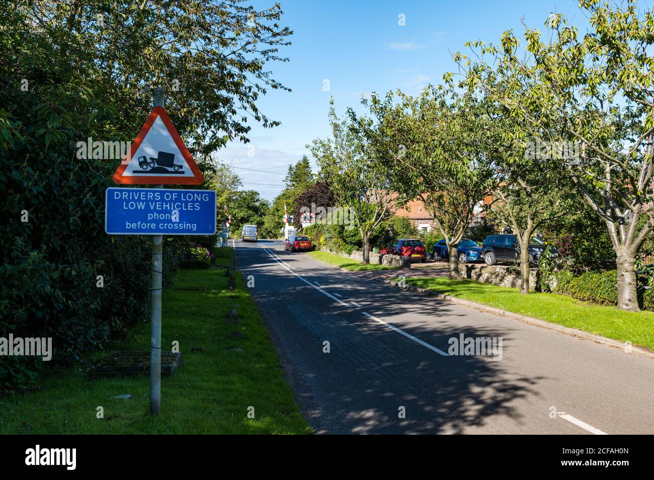 Van on East Coast mainline railway line level crossing, Markle, East