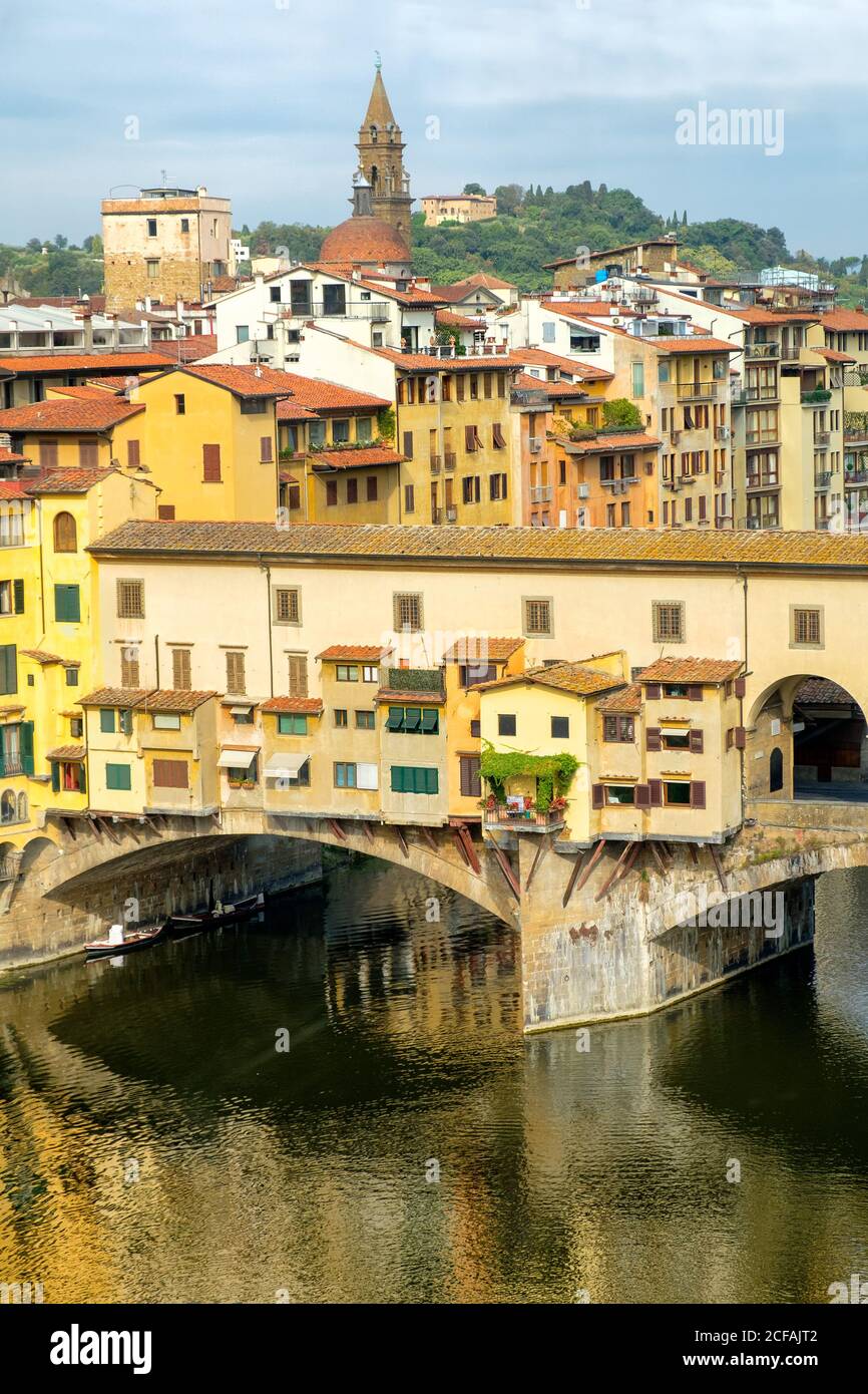 The Ponte Vecchio, a medieval bridge over the river Arno in Florence, Italy Stock Photo