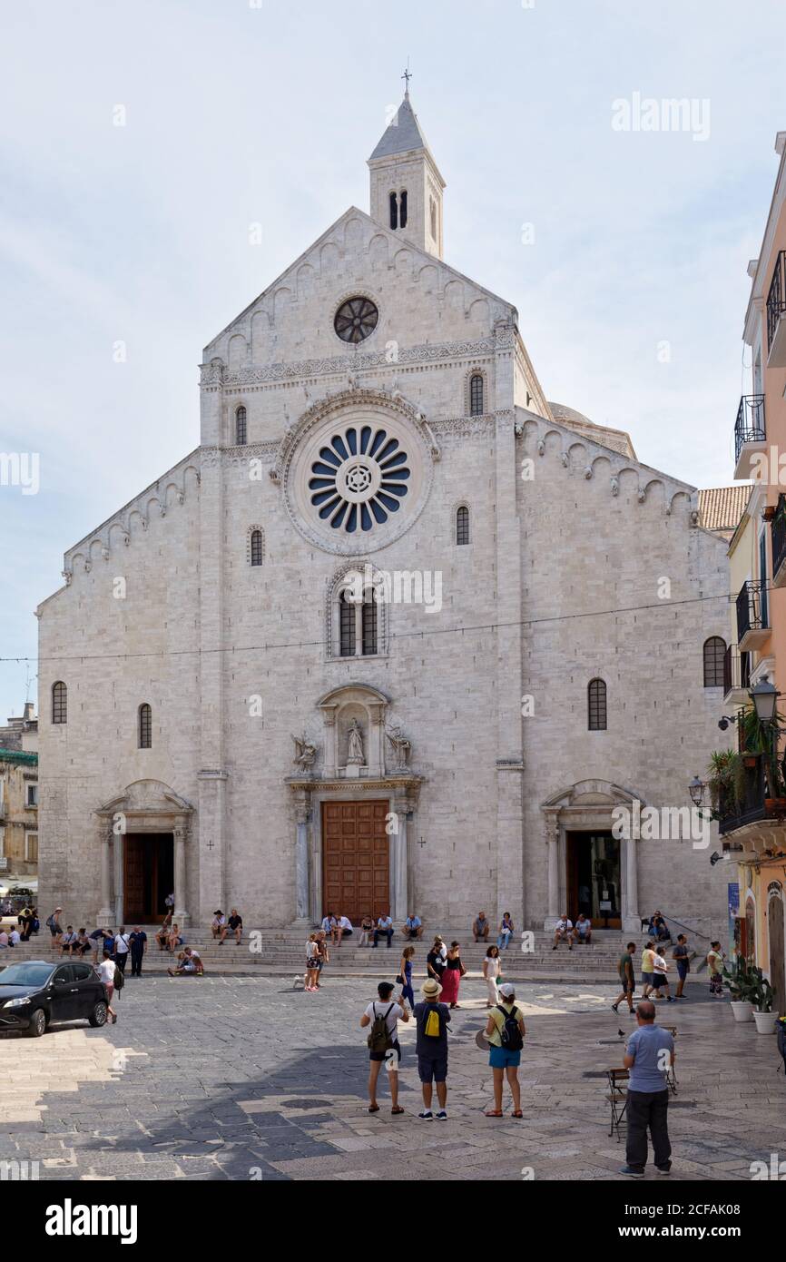 People at Bari Cathedral in Bari, Apulia, Italy. The cathedral was