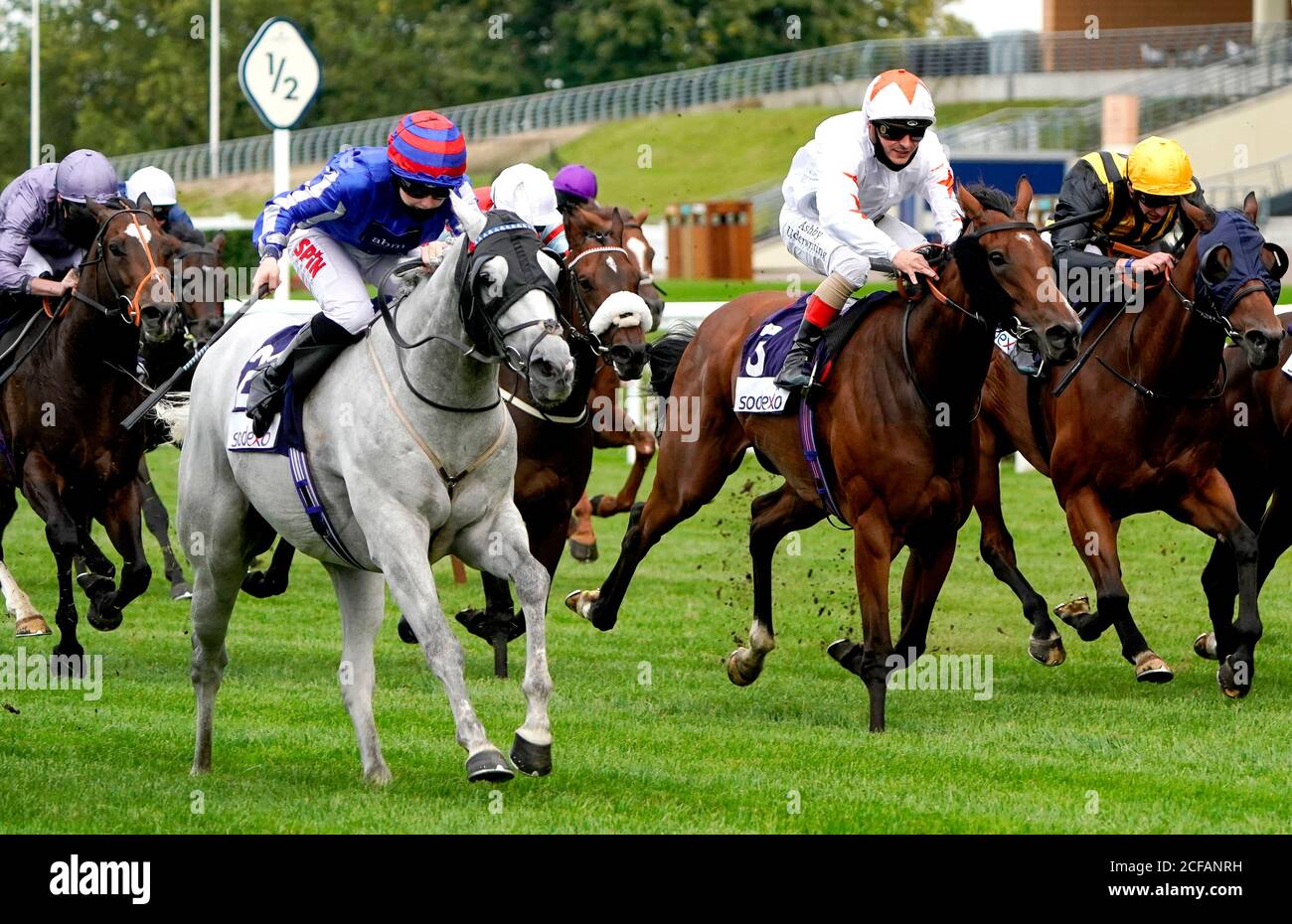 My Style ridden by jockey Georgia Dobie (second left) on their way to winning the Bateaux London Handicap at Ascot Racecourse. Stock Photo