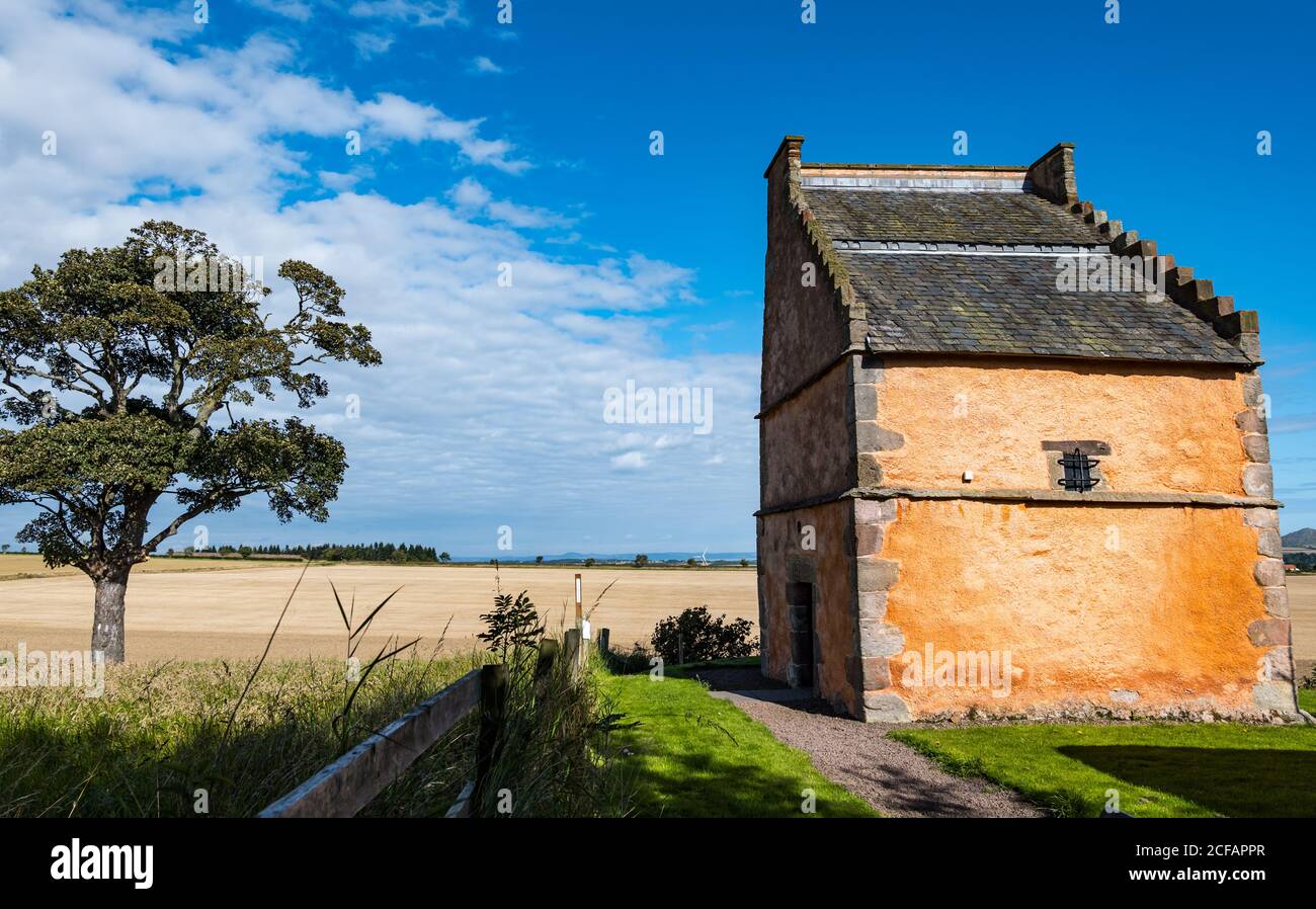 Old lime washed dovecot or doocot, National Flag Heritage Centre in Summer on sunny day, Athelstaneford, East Lothian, Scotland, UK Stock Photo