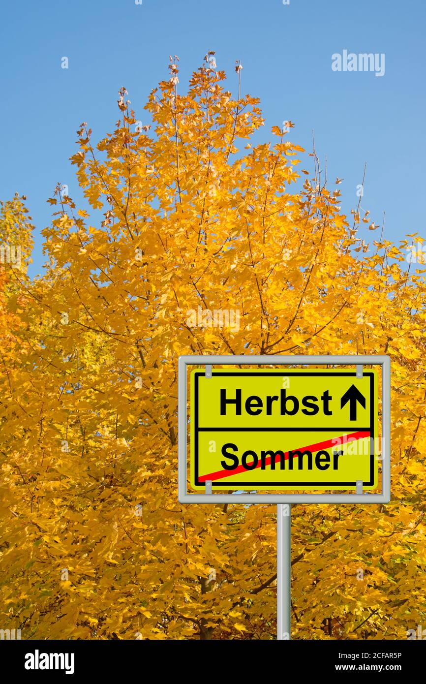 Road sign, end of summer and beginning of autumn, sommer, herbst Stock Photo