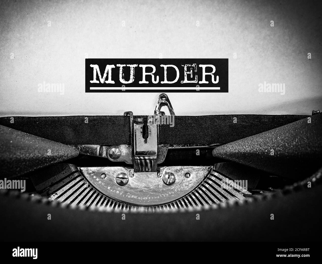 Word murder written on a typewriter Stock Photo