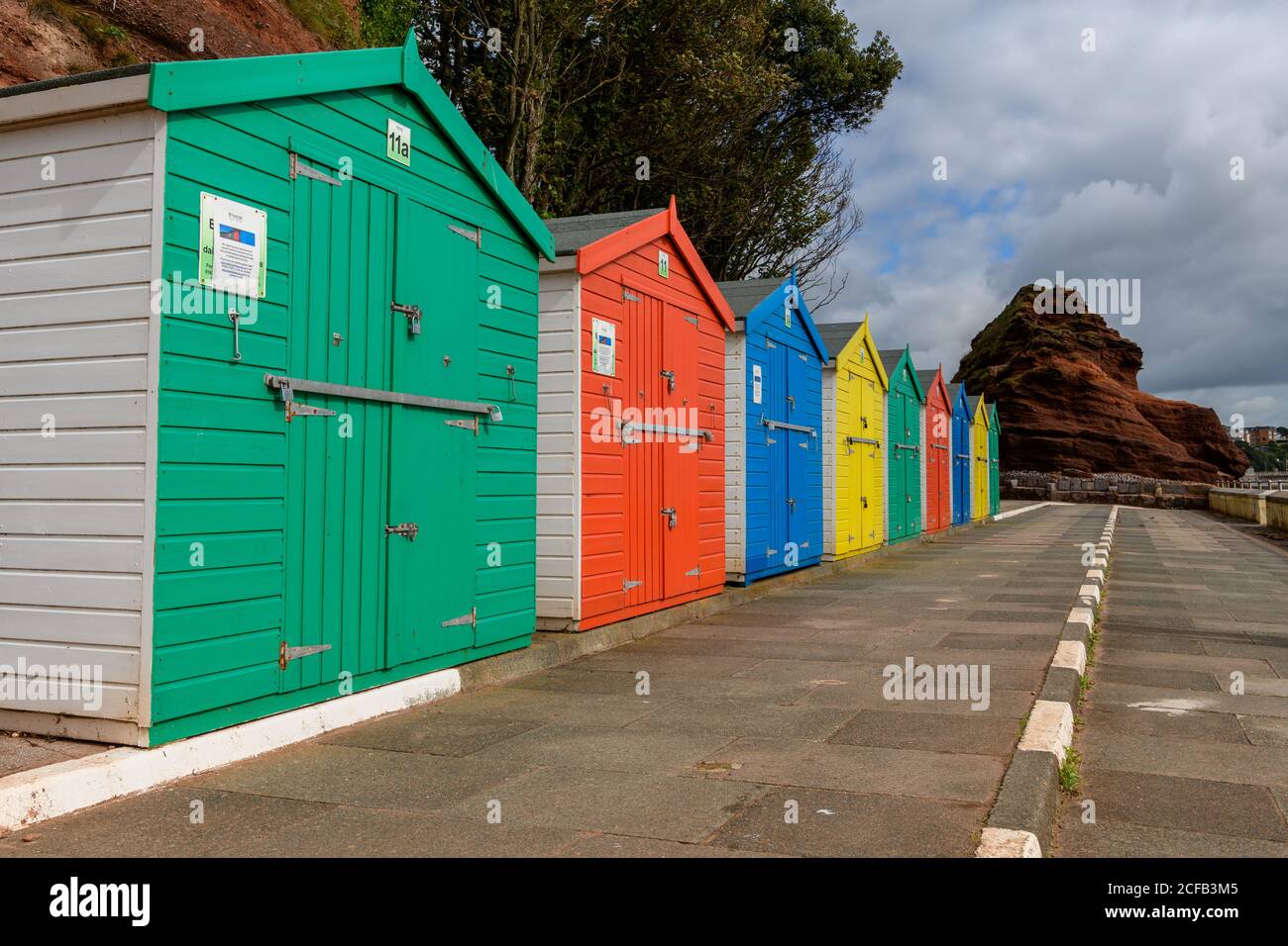 Colorful beach huts in Devon Stock Photo Alamy