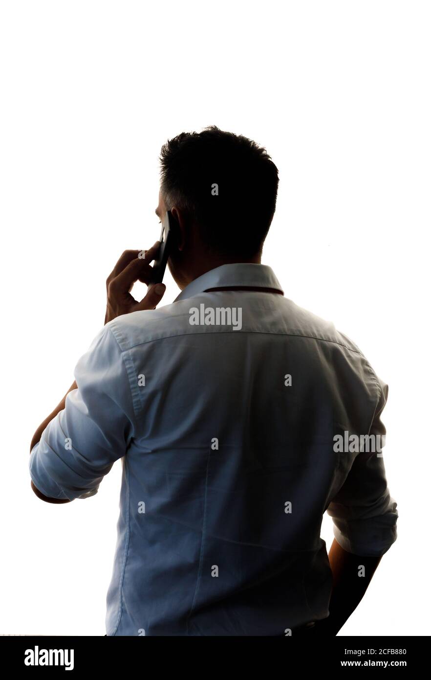 Businessman talking on mobile phone Stock Photo