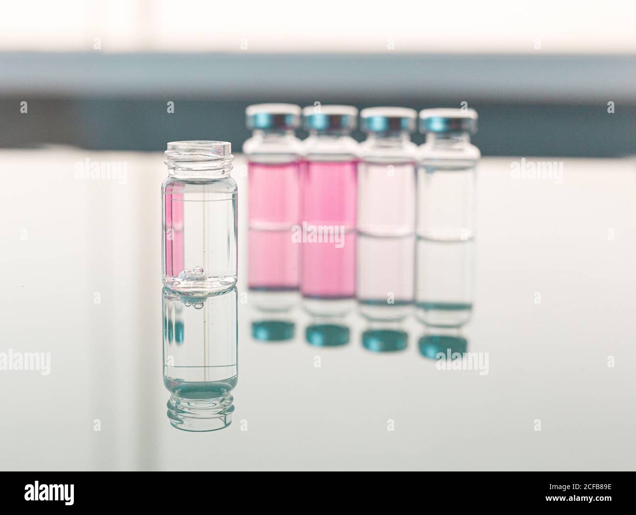 Soft focus of open ampoule with chemical reaction in transparent liquid