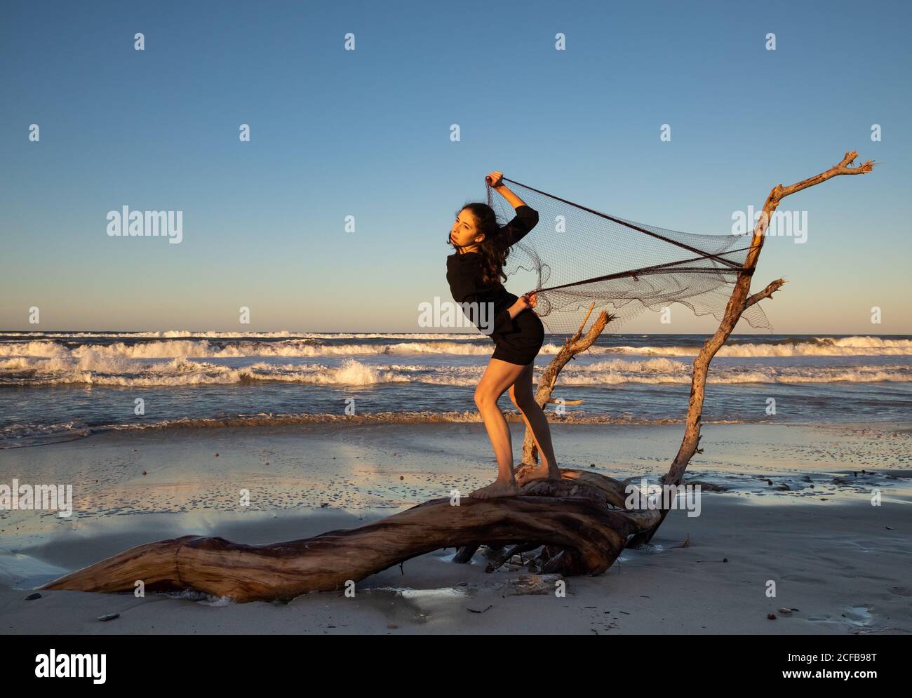 Beautiful young woman fishing net hi-res stock photography and