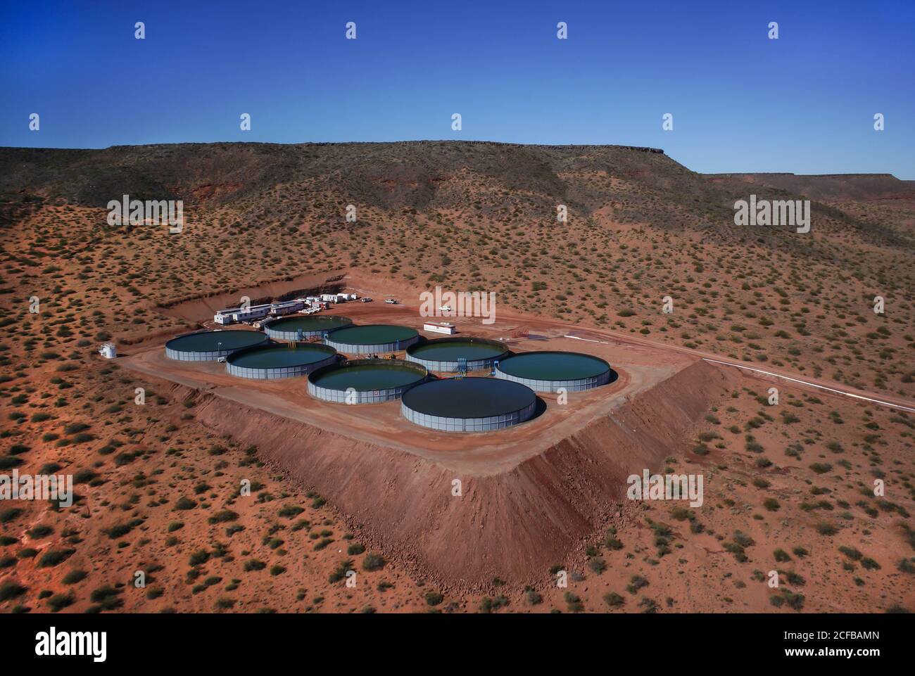 Aerial view of the tank of water and sand in bags, for hydraulic fracturing of unconventional oil Stock Photo