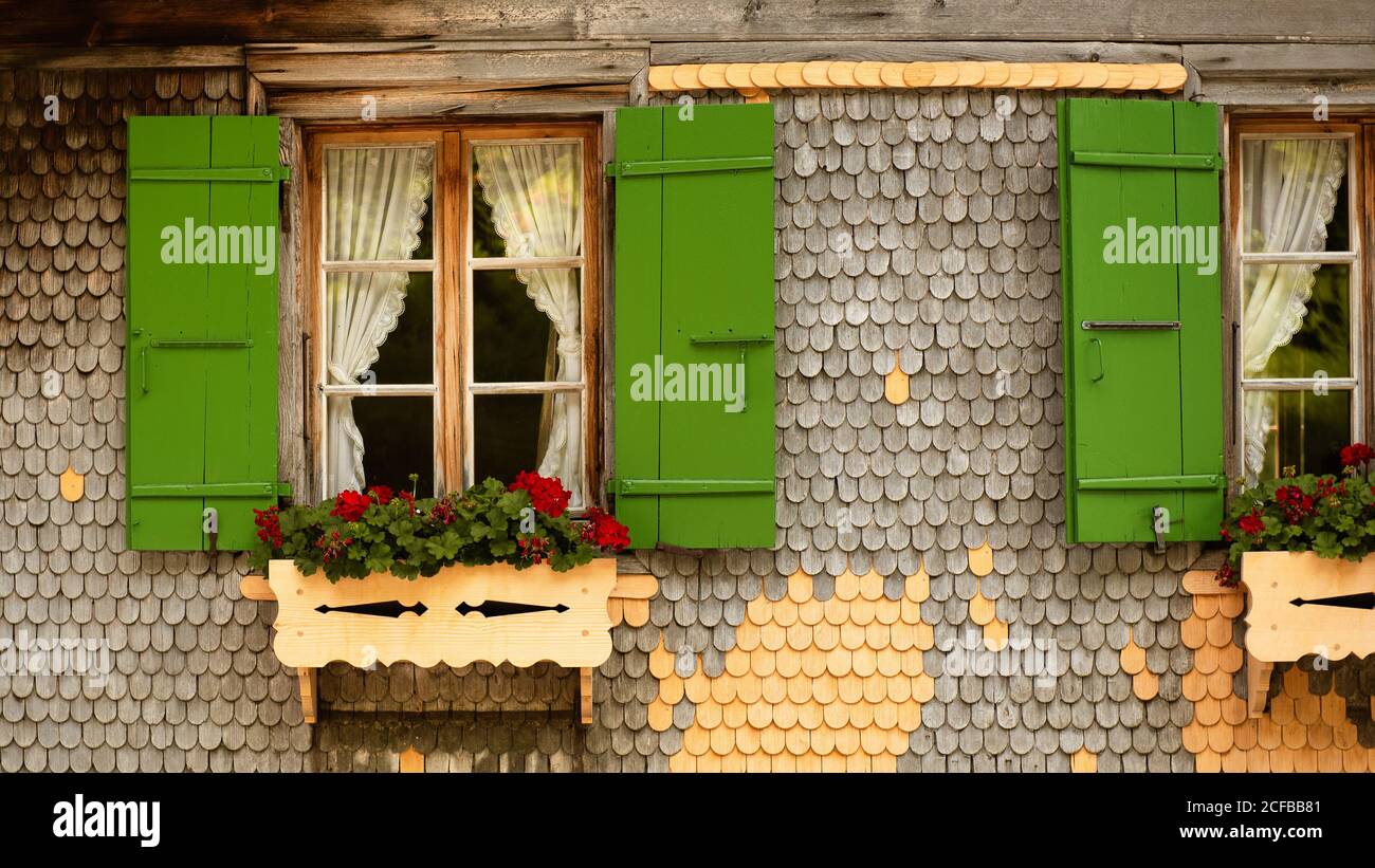 Regional style window shutters, Switzerland Stock Photo