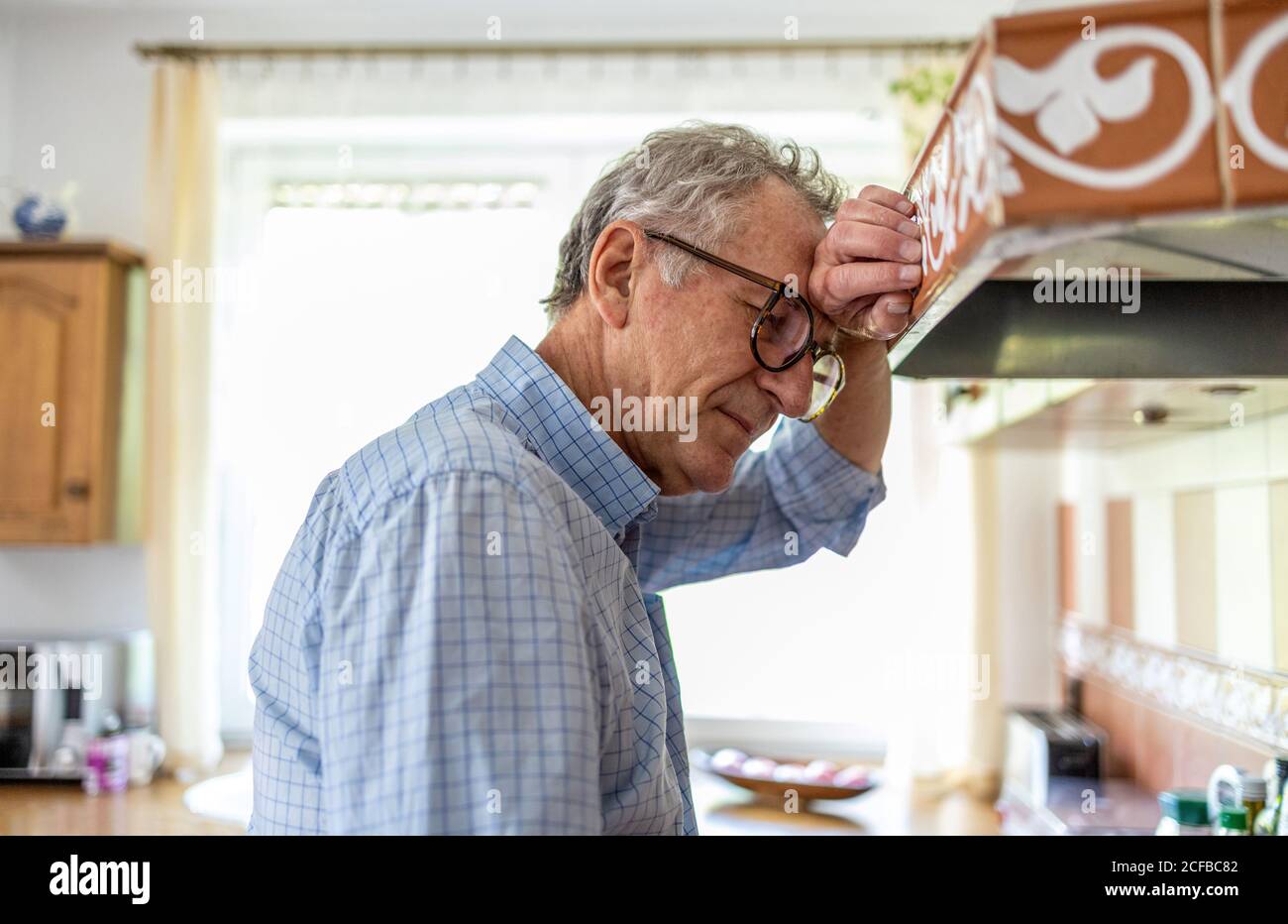 Portrait of senior man looking depressed Stock Photo
