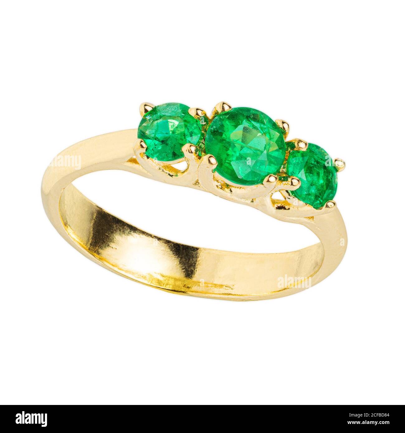 Gold diamond and gemstone wedding ring closeup macro isolated on white background Stock Photo