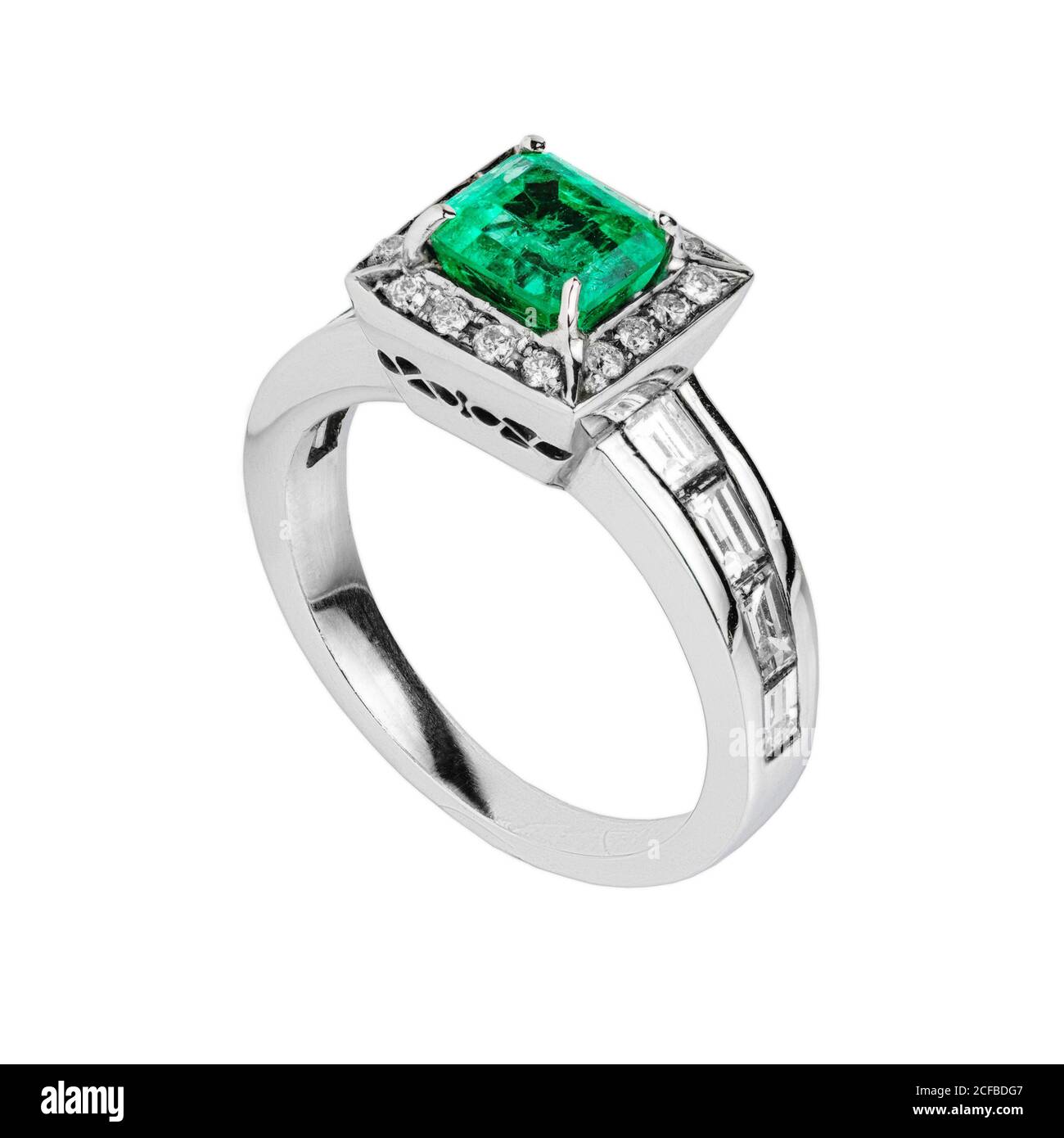 Silver diamond and gemstone wedding ring closeup macro isolated on white background Stock Photo