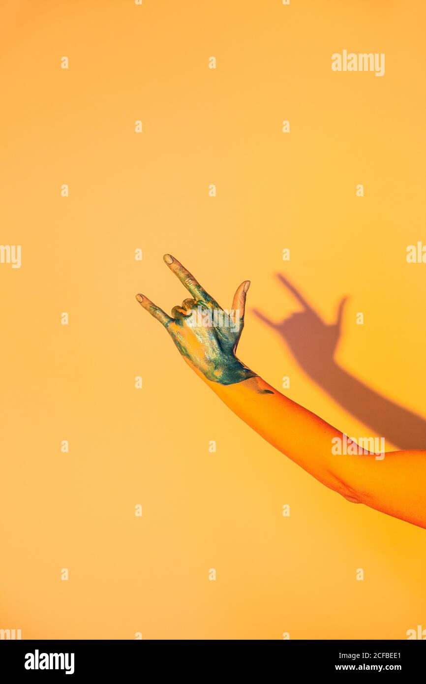 Hand orange gloss hi-res stock photography and images - Alamy