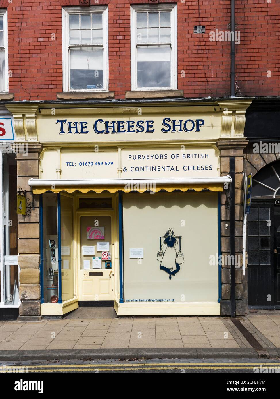 Cheese shop at Morpeth, Northumberland, UK displaying coronavirus restriction measures. Restrictions to combat the pandemic have hit small businesses. Stock Photo