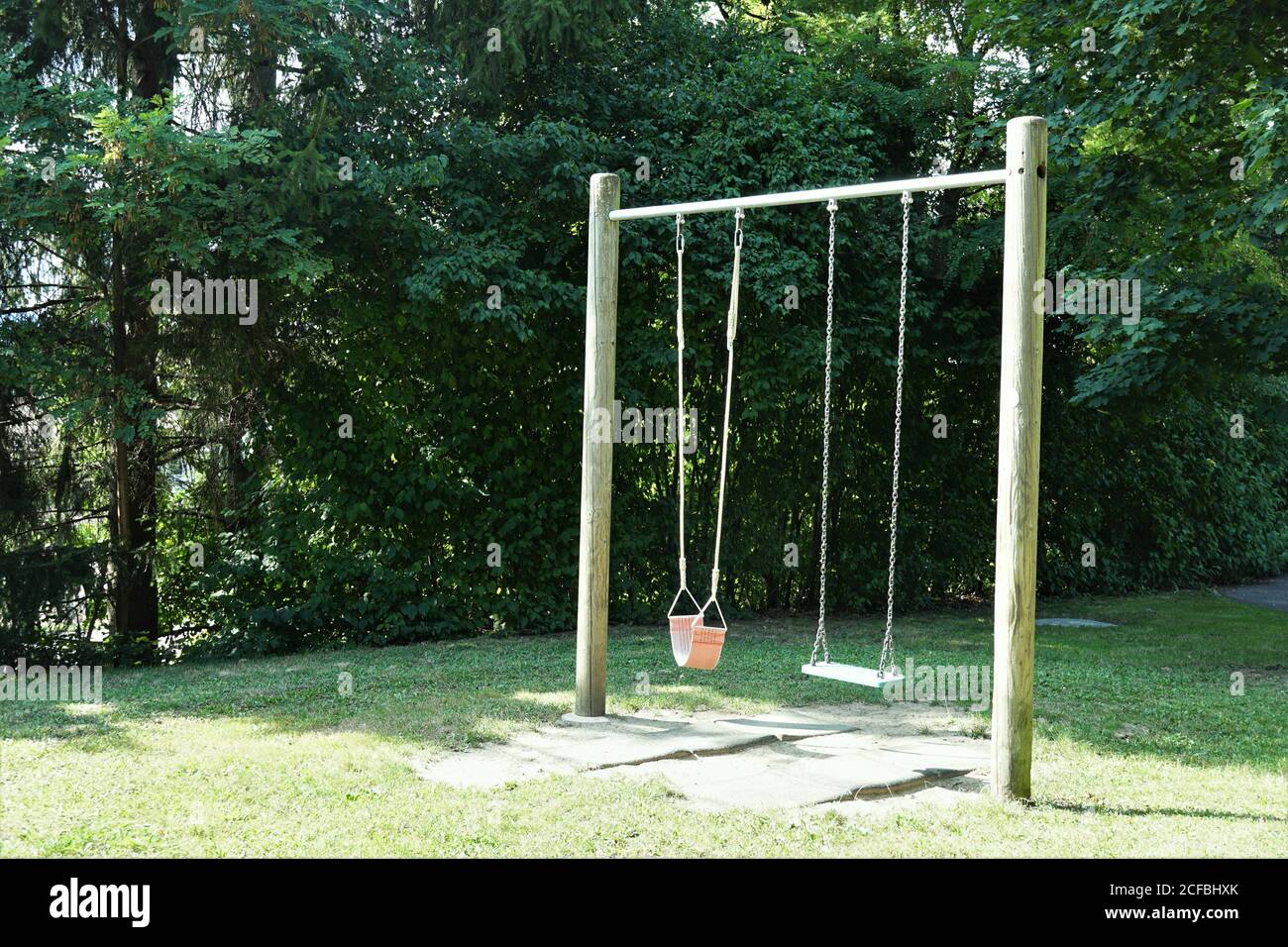 Playground children swing bar hires stock photography and images Alamy