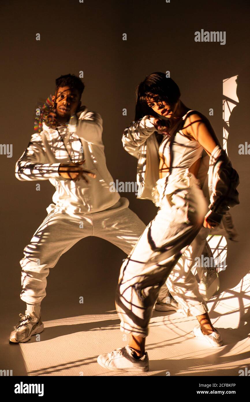 Trendy dancers posing for camera Stock Photo