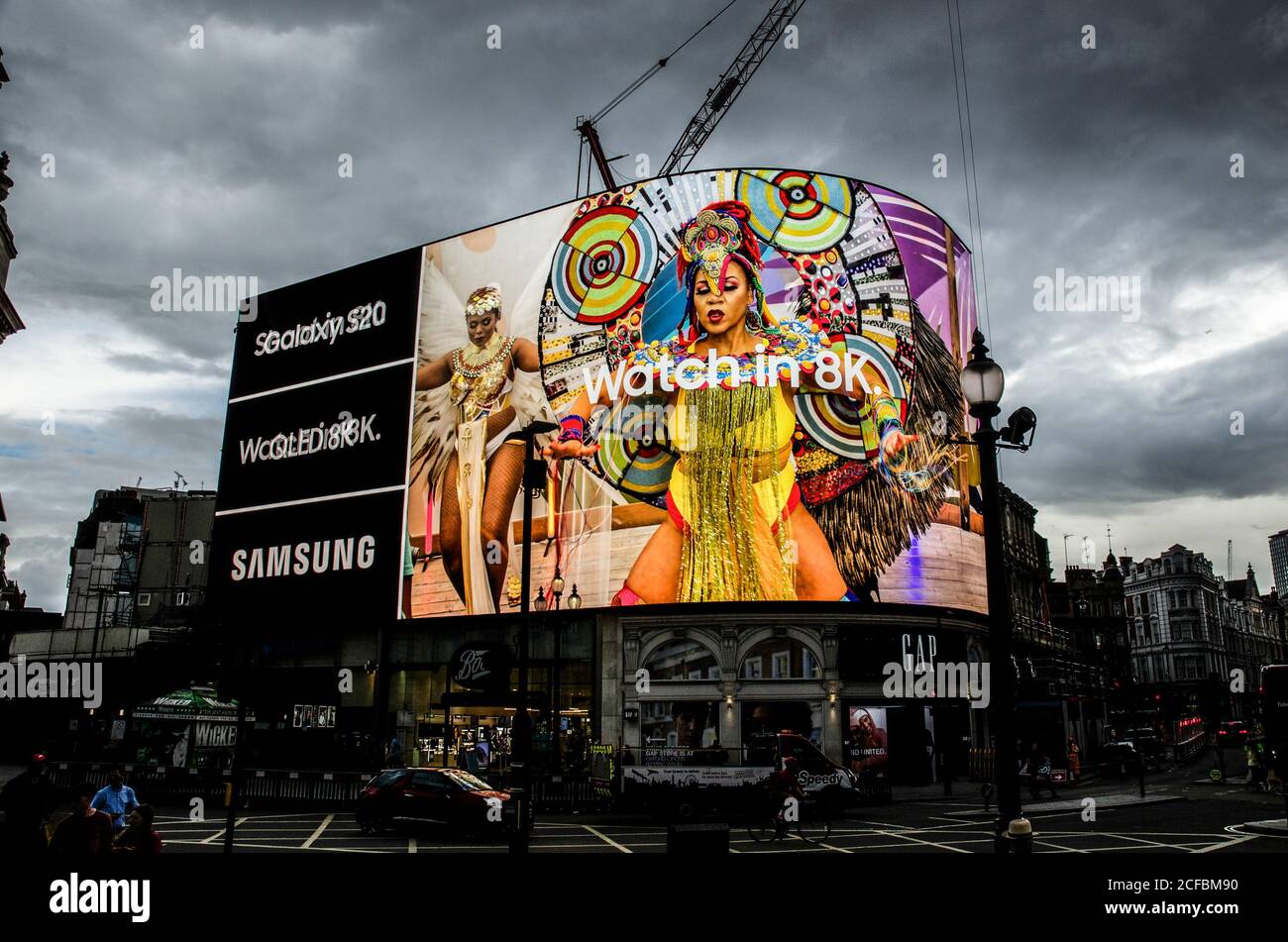 The Notting Hill Carnival moved online for the first time in its history.  This is the launch of the trailer on the iconic Picadilly Circus screens  Stock Photo - Alamy