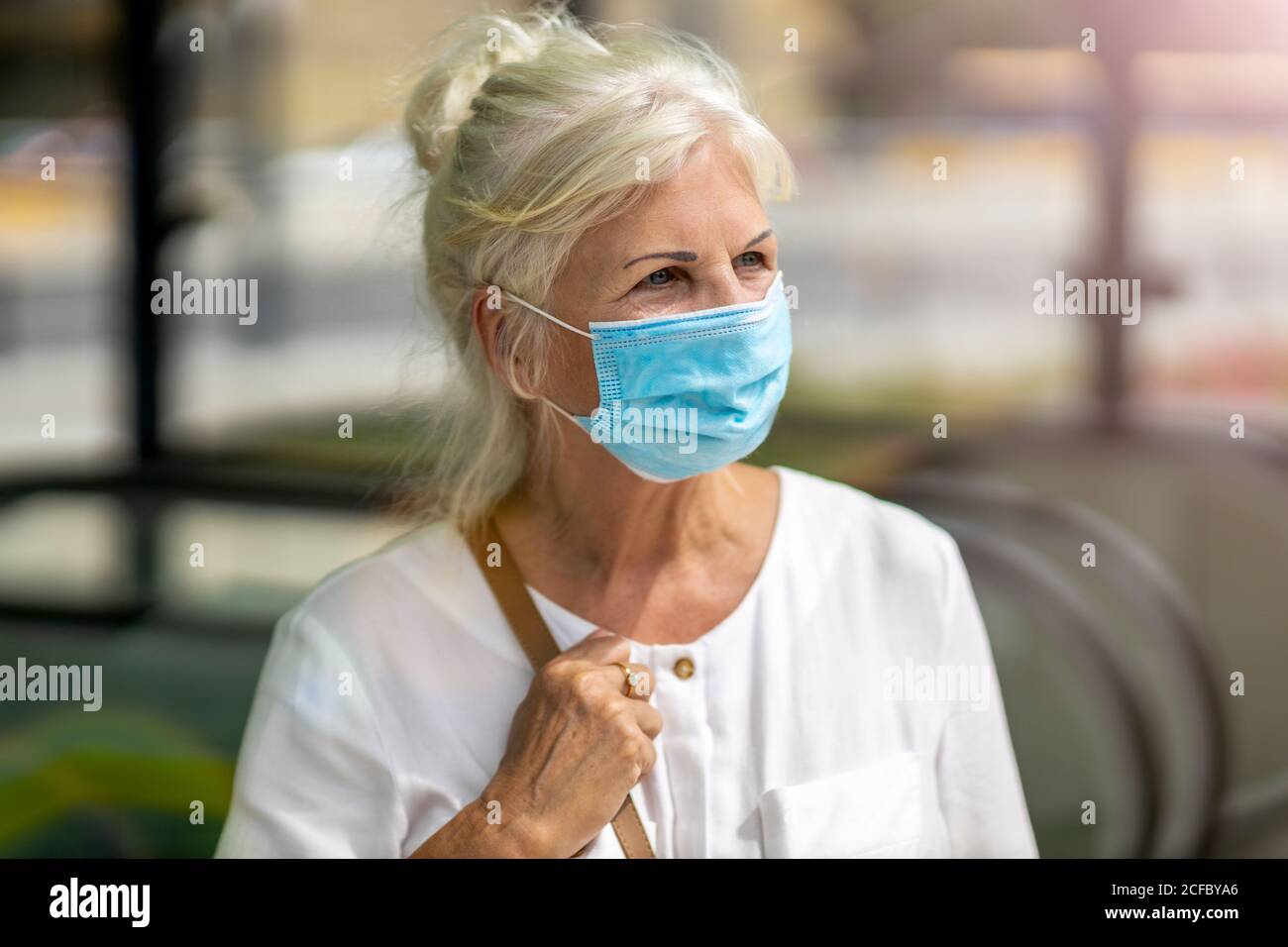 Elderly woman wearing medical hi-res stock photography and images - Alamy