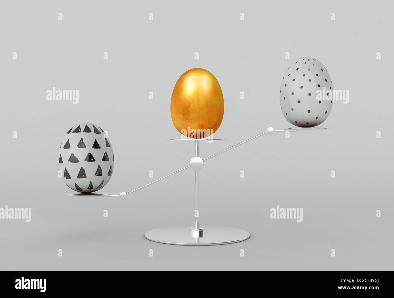 Balance concept with painted decorated easter eggs on grey background Stock Photo