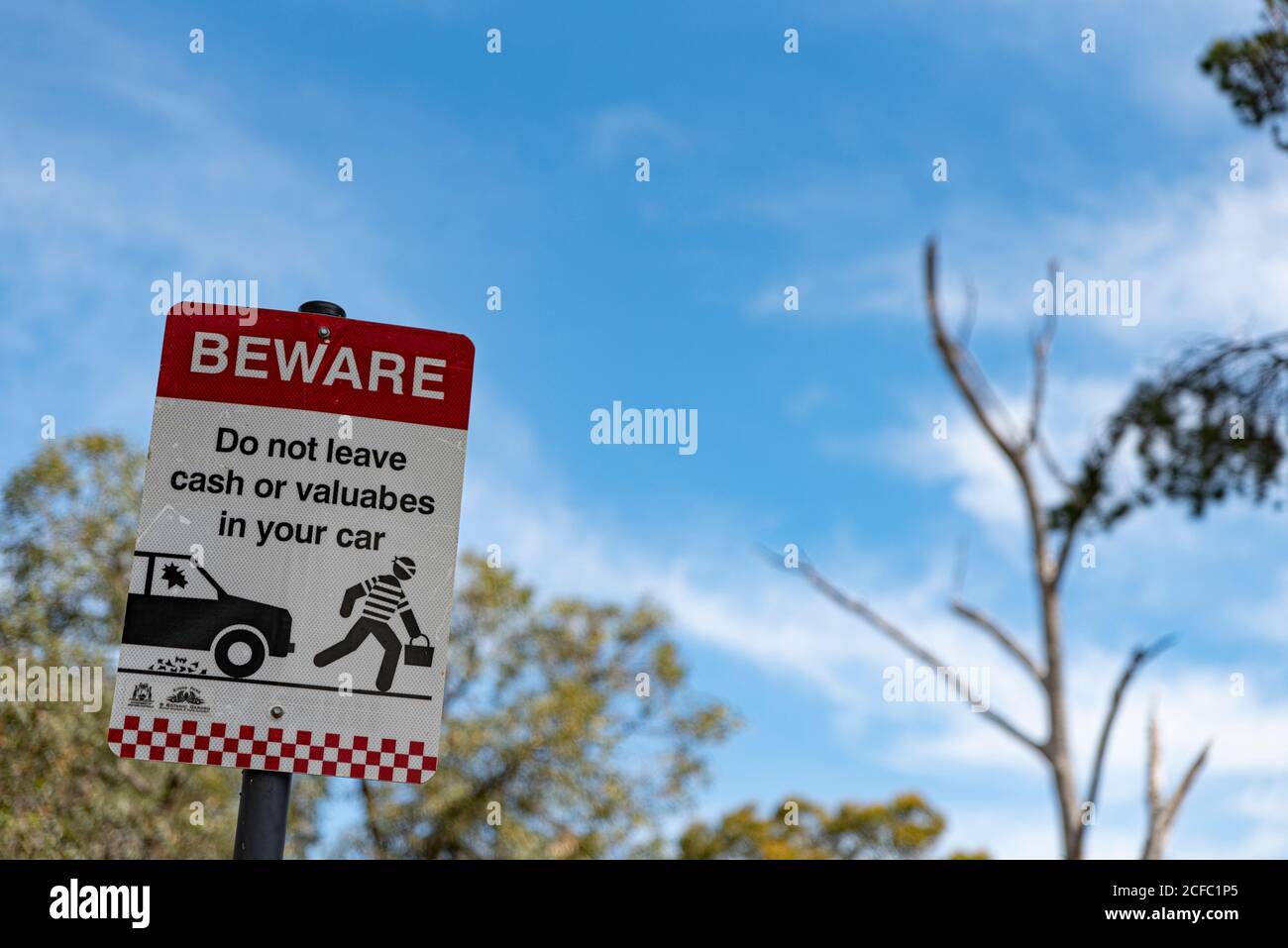 Perth, Nov 2019: Informational and warning sign with icons for tourists in the car park. Beware of thieves in public park Stock Photo