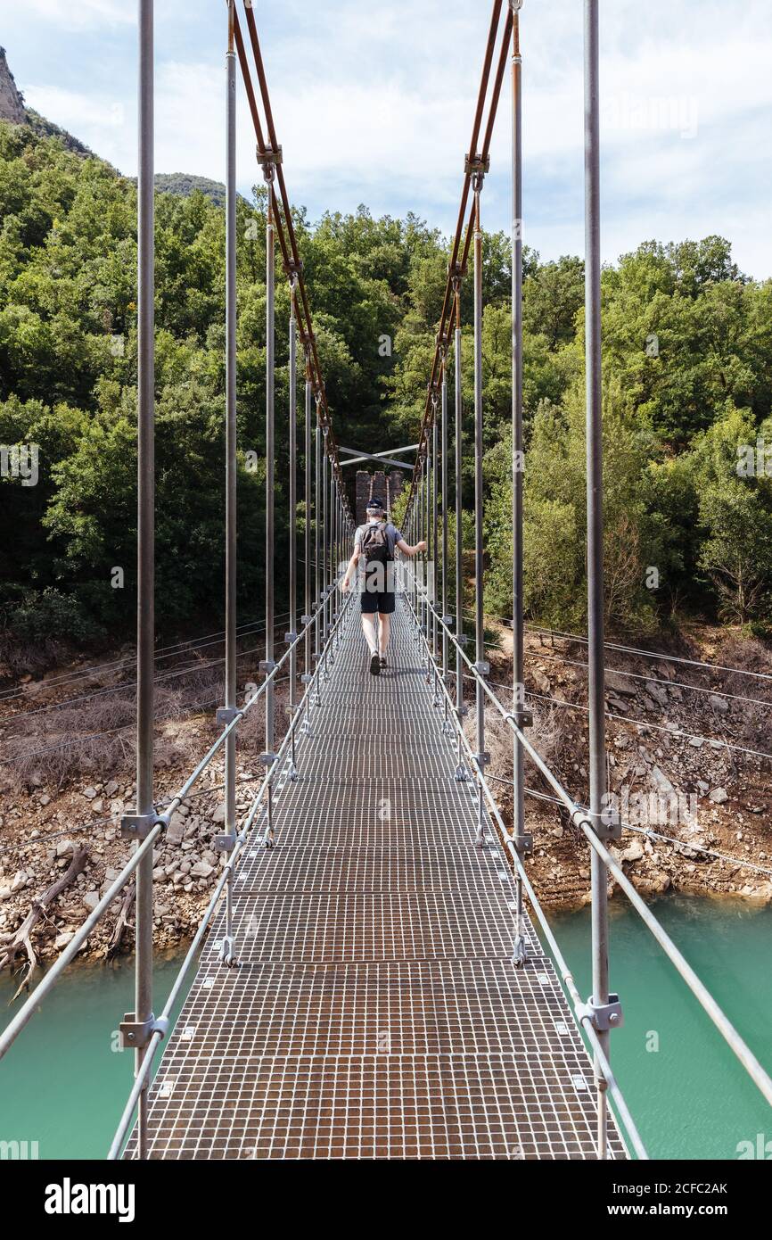 Man crossing a bridge hi-res stock photography and images - Alamy