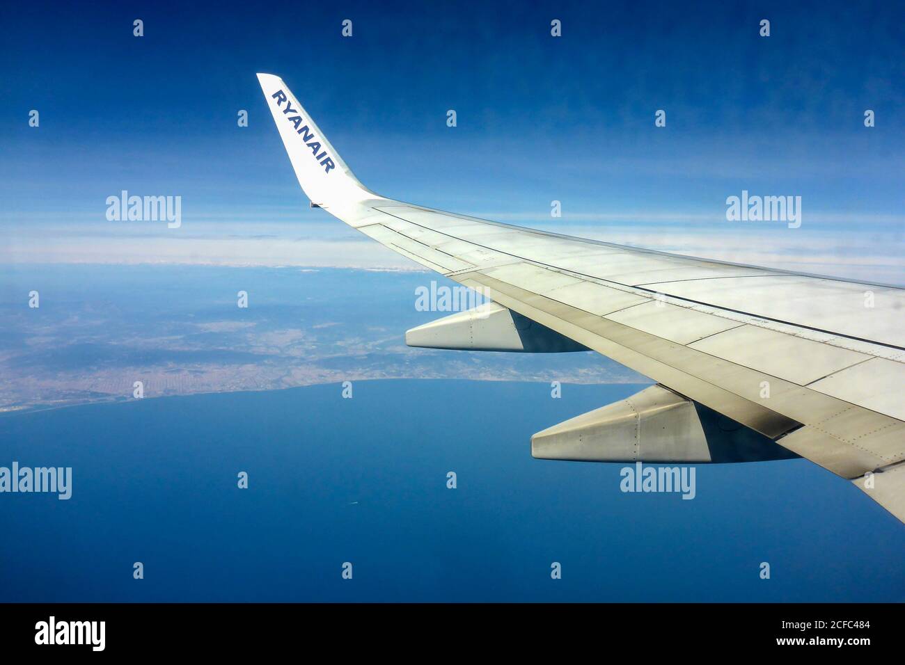 Ryanair plane over Spain, detail, wing Stock Photo