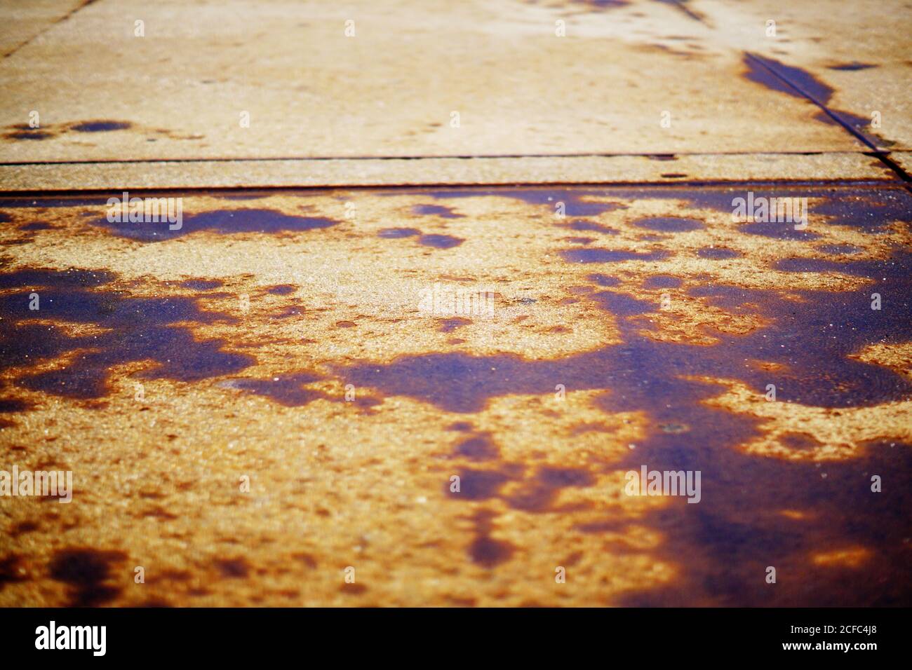 Dripping Rusted Iron Closeup of painted rusty iron surface with corrosion spots and dirt ...