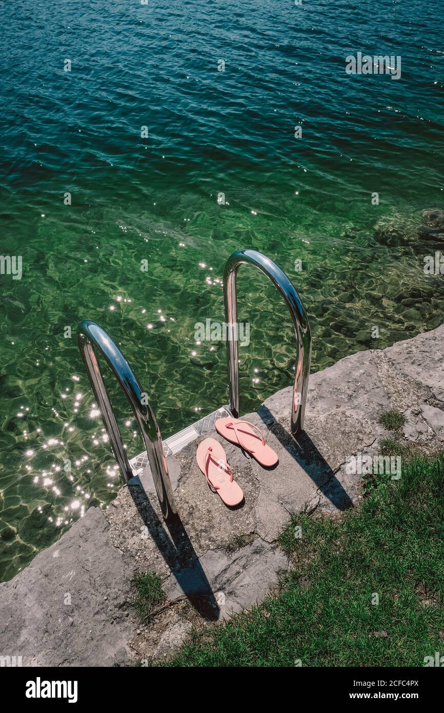 Flip flops on the lake Stock Photo