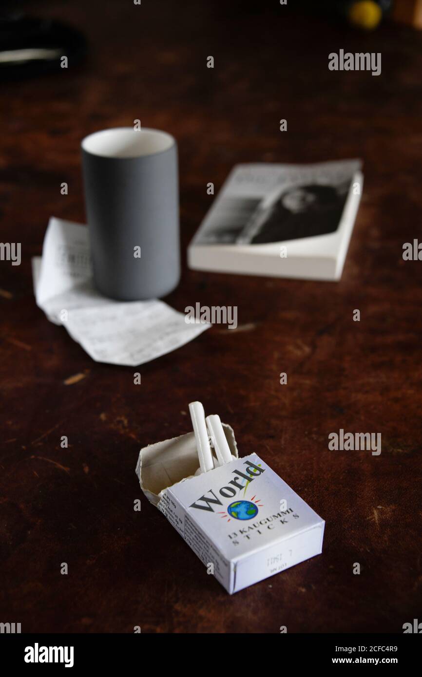 Cigarettes on wooden table Stock Photo