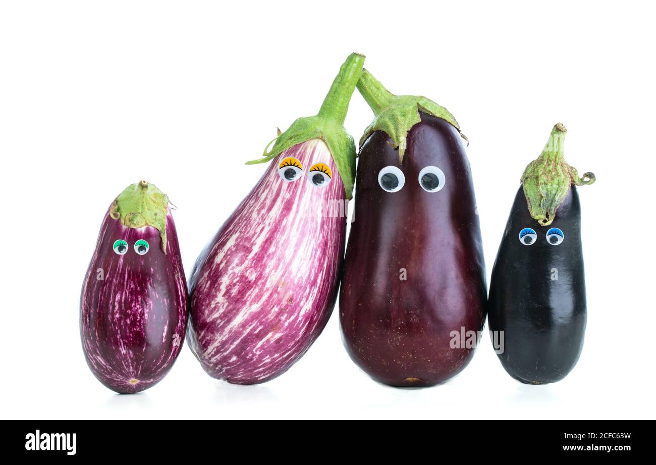 Eggplant family with eyes on a white background cut out on a white