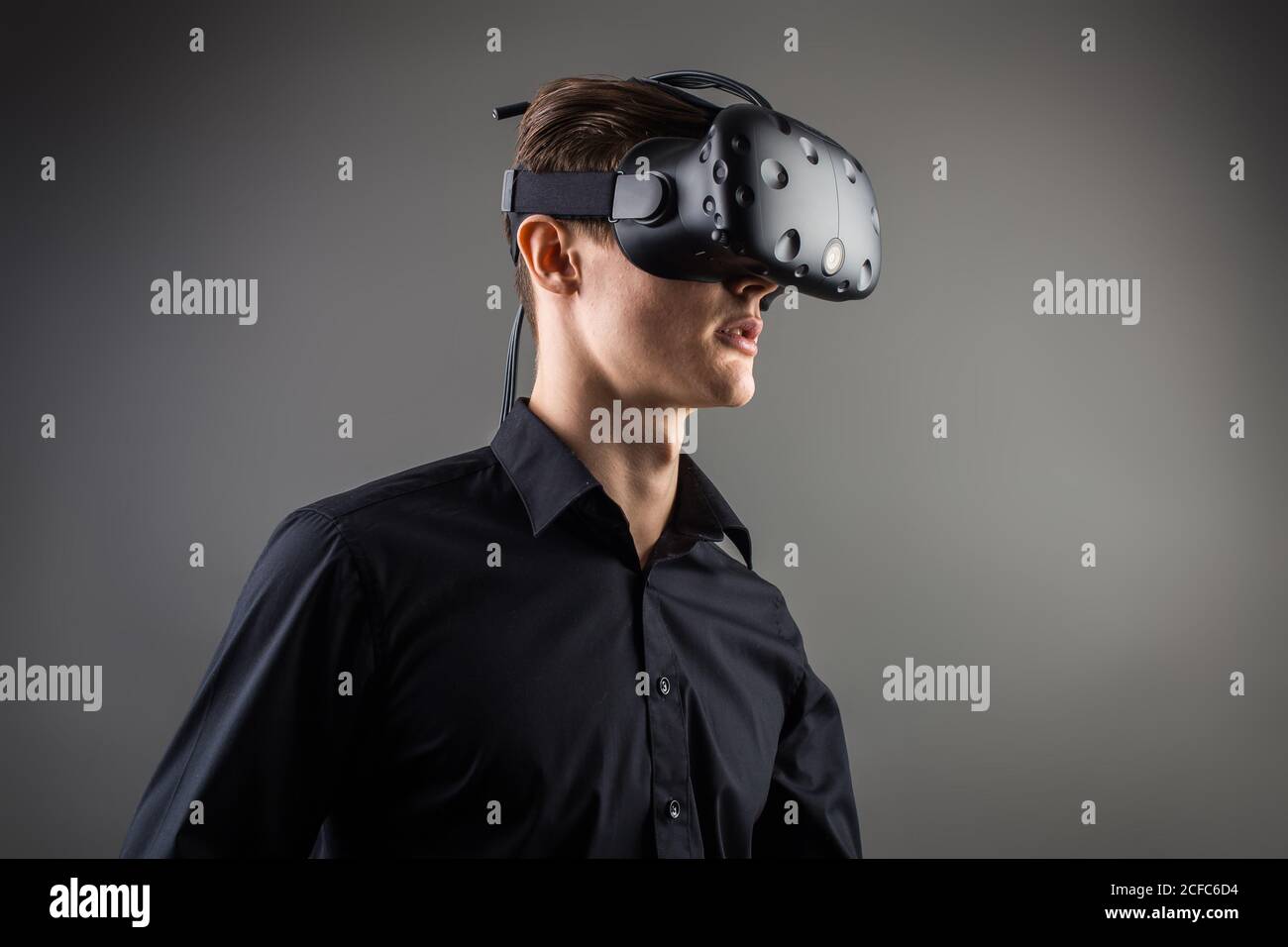 Businessman making gestures when wearing virtual reality goggles Stock ...