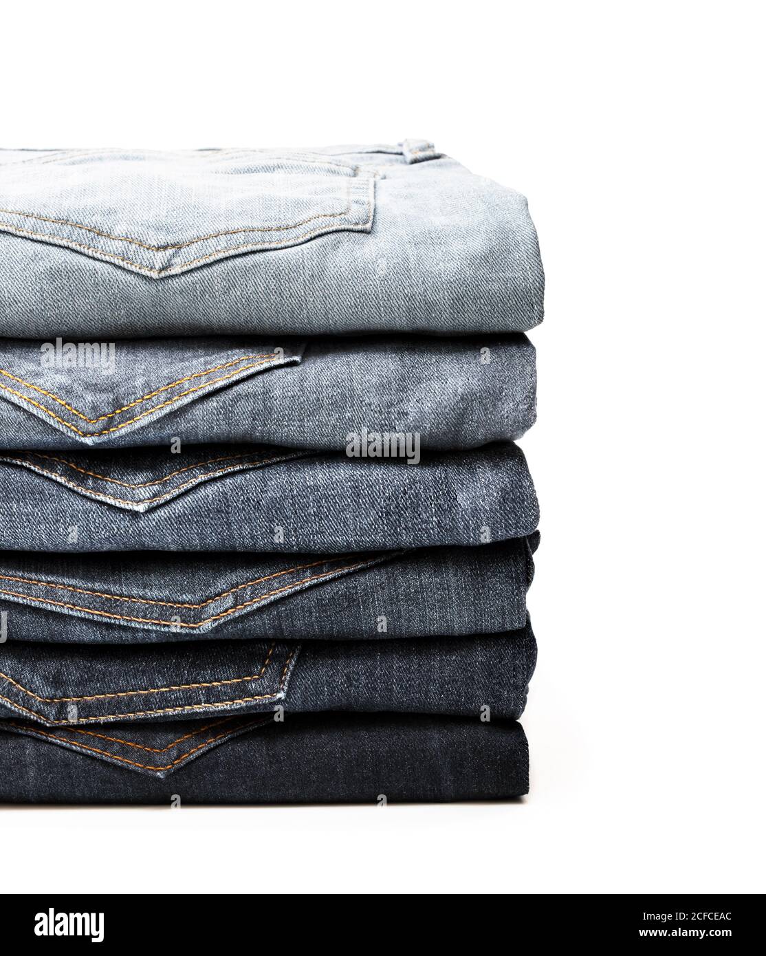 Lot of grey used women jeans stacked in a pile isolated on white Stock  Photo - Alamy